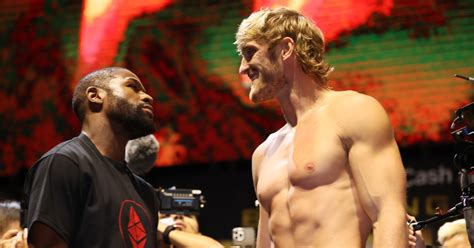 Logan Paul vs. Floyd Mayweather Fight Weigh-In Goes Off the Rails With Crazy Smack Talk - Maxim