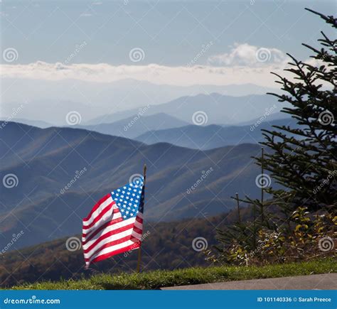 American flag in mountains stock photo. Image of national - 101140336