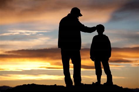 Father And Son Hugging Silhouettes Stock Photos, Pictures & Royalty-Free Images - iStock