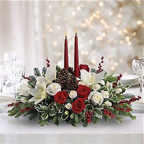 Beautiful Christmas Flower Centerpieces Ideas To Freshen Up Your Home 50 | Christmas floral ...