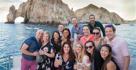 Cabo San Lucas: Catamaran Party Tour with Snacks & Open Bar | GetYourGuide