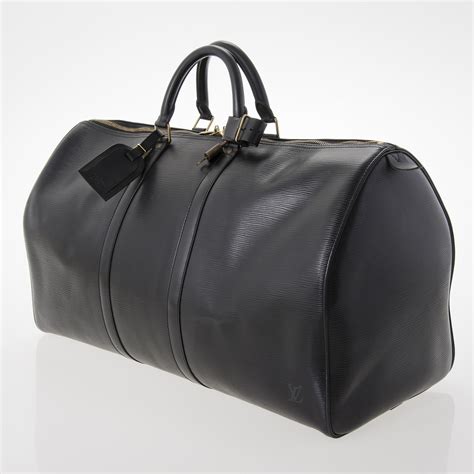 LOUIS VUITTON, BLACK EPI LEATHER KEEPALL 55 TRAVEL BAG. - Bukowskis