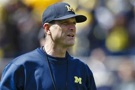 WATCH: Jim Harbaugh penalized after sideline tantrum, breaks headset