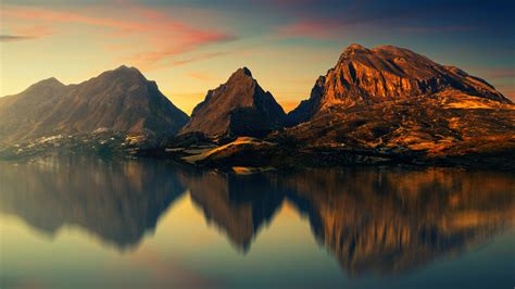 Brown Mountain Near Body of Water · Free Stock Photo