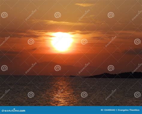 Sunset and a big sun stock photo. Image of scene, clous - 134400442