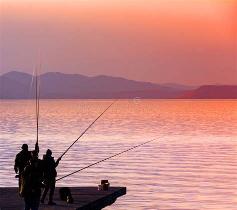 Fishermanes Silhouette Fishing at Sunset on the See Stock Photo - Image of lure, lake: 164526636