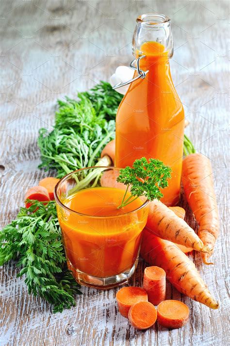 Carrot juice and organic carrots | High-Quality Food Images ~ Creative Market