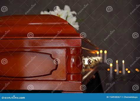 Wooden Casket with White Lilies in Funeral Home, Stock Image - Image of candles, closeup: 154938367