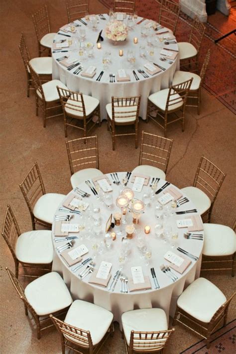 I like the difference in centerpieces between these two tables. (via Style Me Pretty, Illinois ...