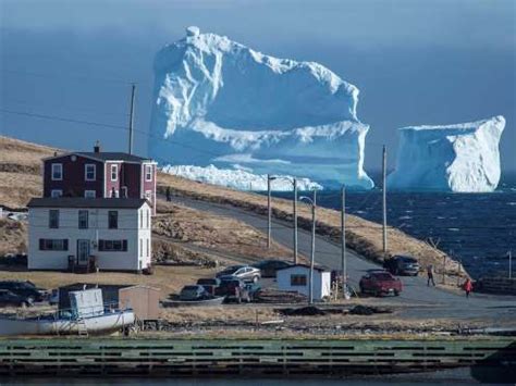 A giant iceberg spotted off the Canadian coast is attracting swarms of tourists | Newfoundland ...