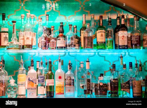 Bar Wall Display of Liquor Bottles Stock Photo - Alamy