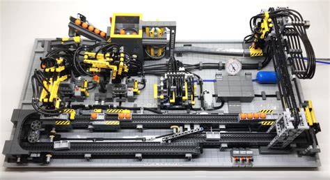 Three LEGO motors, 17 LEGO pneumatic cylinders and a pinch of ...