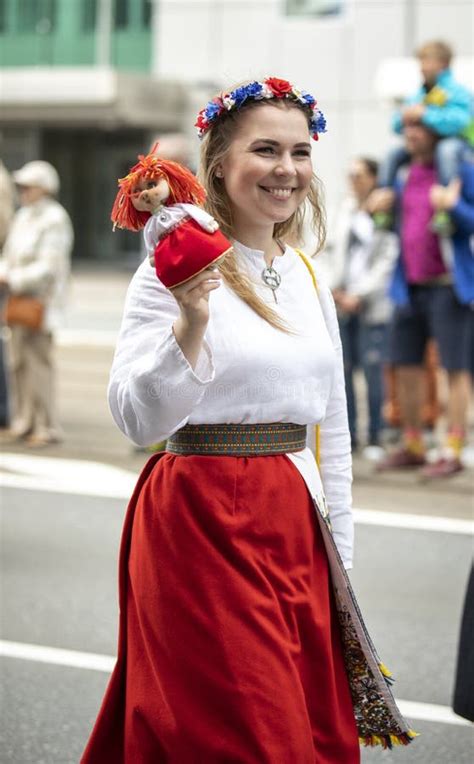 Estonian People in Traditional Clothing Walking the Streets of Tallinn ...