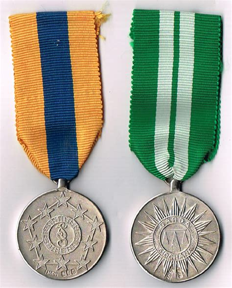 Garda Siochana pair of medals struck in sterling silver. at Whyte's ...