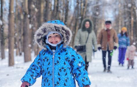 Kid Playing in a Winter Park and Have Fun with Family Stock Image - Image of knitted, childhood ...