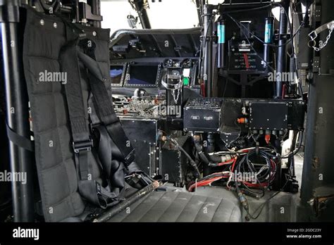 The interior of the MH-60R Seahawk is cramped with all types of ...