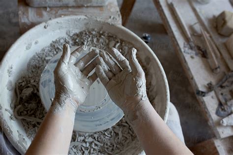 "Woman Making Pottery On Spinning Wheel In Her Workshop" by Stocksy ...