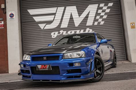 NISSAN SKYLINE GT-R R34 NISMO -CARBONO EXTERIOR VISIBLE-