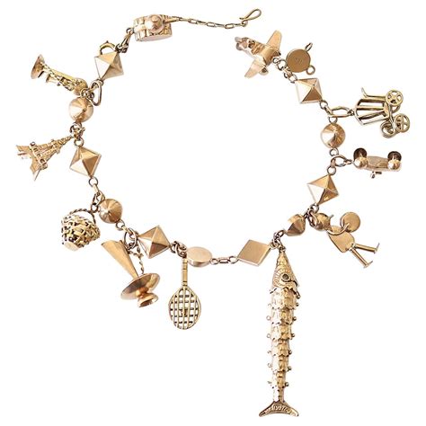 Hermes Gold Six Charm Bracelet at 1stDibs