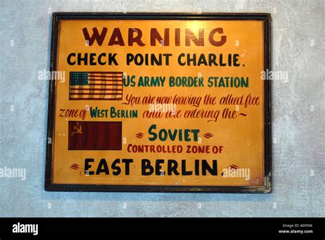 Checkpoint Charlie sign from the cold war era of Berlin Stock Photo - Alamy