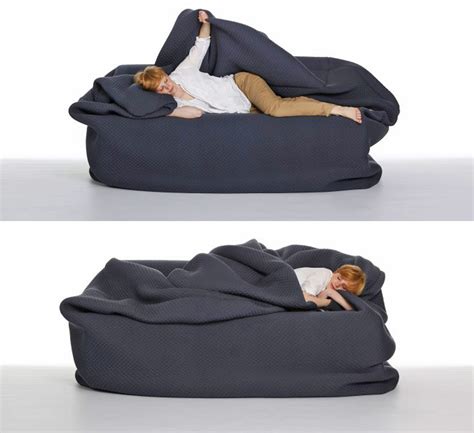 A Bean Bag Bed With Built-in Blanket and Pillow