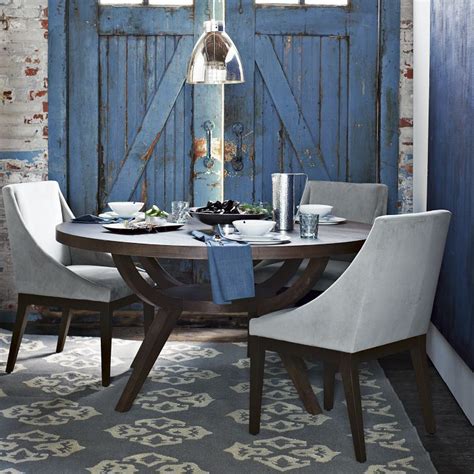 Blue rustic doors in dining room | Pedestal dining table, Dining room small, Dining table design