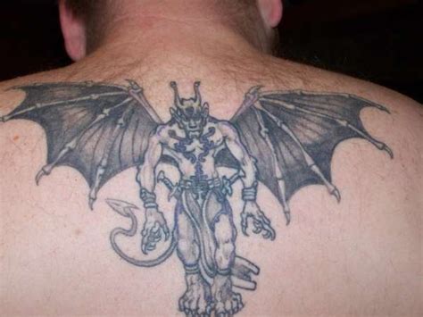 Humanised winged demon tattoo on back - Tattooimages.biz