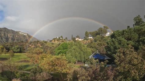 WATCH: Rainbow follows snow at Hollywood sign | wthr.com