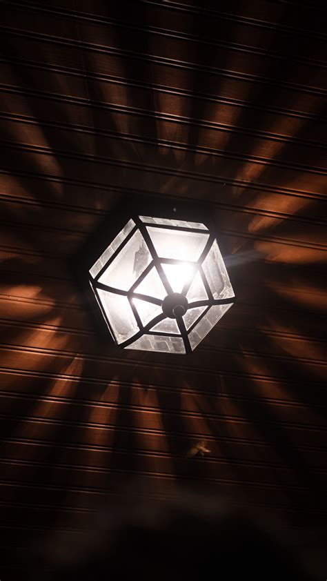 Download wallpaper 1350x2400 lamp, chandelier, light, rays, shadows, wood, dark iphone 8+/7+/6s ...