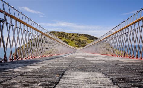 Tintagel Castle Bridge in Cornwall has a gap where it meets in the ...