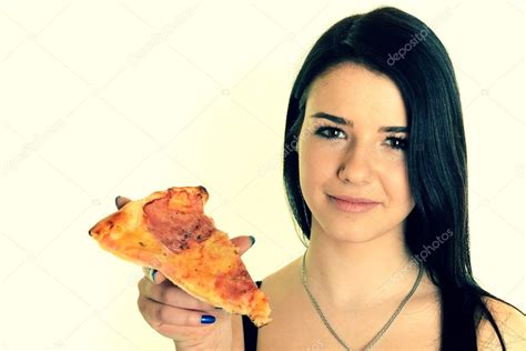 Girl eating a delicious pizza Stock Photo by ©muro 21292403