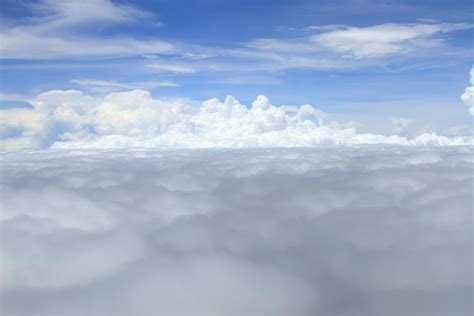 Airplane above clouds 10340131 Stock Photo at Vecteezy