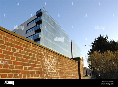 Brick wall and facade of office building against a clear blue sky Stock ...