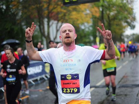 Manchester Half Marathon in pictures: Runners brave the torrential rain to complete route ...