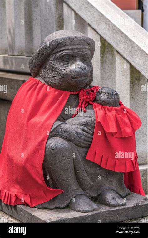 Tokyo - August 14, 2018 : Sarugami or Komazaru stone carved monkey guardian at Honden (Main Hall ...