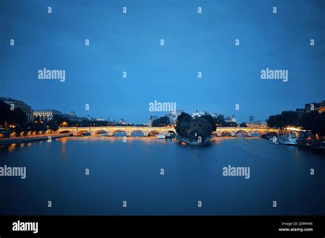 River Seine and bridge at night in Paris, France Stock Photo - Alamy