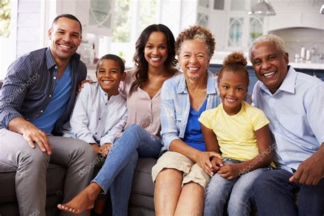 Multi generation black family at home Stock Photo by ©monkeybusiness 109942480