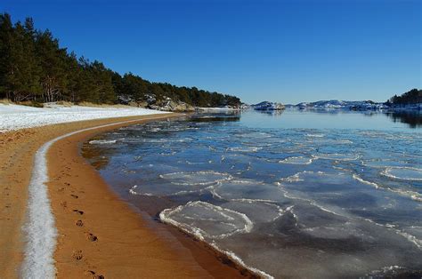 Snow on the Beach Photograph by Sonya Kanelstrand | Fine Art America