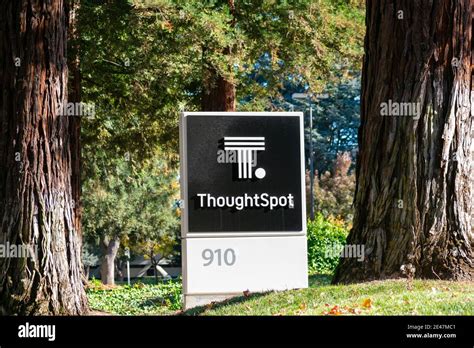 ThoughtSpot logo, sign on signpost at headquarters.ThoughtSpot, Inc. is a technology company ...