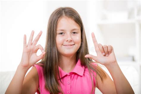 Smiling Deaf Girl Using Sign Language Stock Photo - Image of deafness, otolaryngology: 61421604