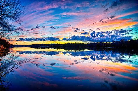 Sunset And Reflection With Beautiful Sky Rainbow Colors Photograph by Alex Grichenko - Fine Art ...