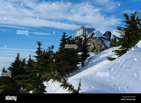 Fire Lookout Cabin in The Snow Stock Photo - Alamy