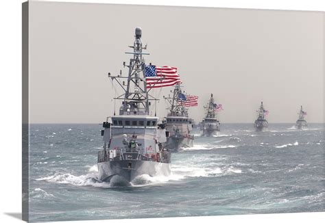 The Cyclone-Class Coastal Patrol Ship USS Hurricane Leads Other Ships ...