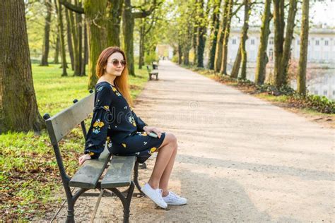 Girl Sitting Alone on a Bench Stock Image - Image of nature, caucasian: 96210707