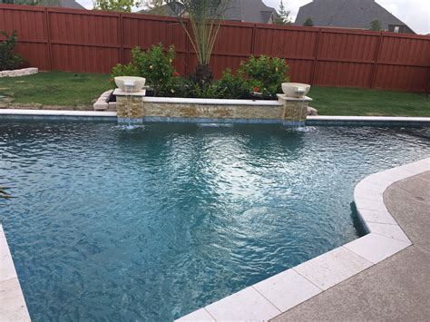 Small pool with waterfall wall feature. We build small pools that ...