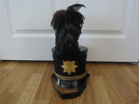 military shako tar bucket hat with plume | Collectors Weekly