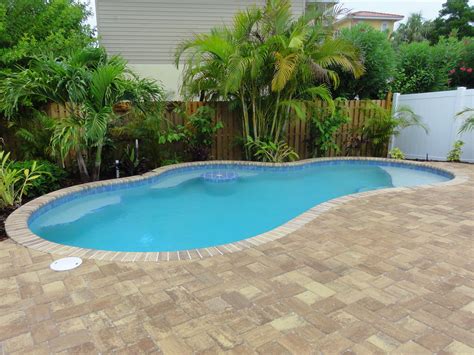 Perfect size beach pool for small backyards~ cocktail table and shelf entry #PoolLandscapingIdea ...