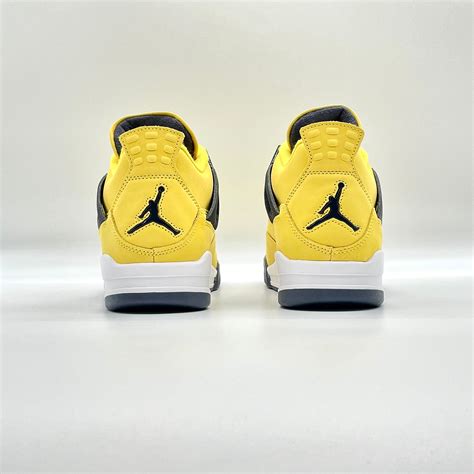 Jordan 4 Retro Lightning (2021) – FABULOUS CONSIGNMENT STORE