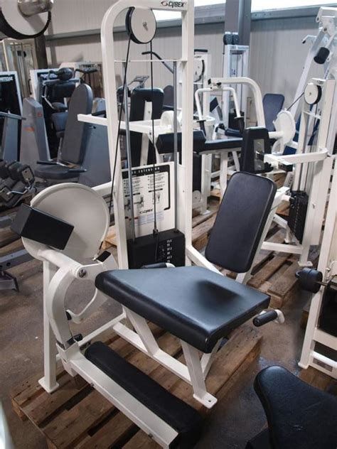 Ad - Cybex Strength Training Equipment, 12 machines, white and black, used