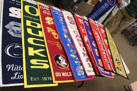 ASSORTED COLLEGE BANNERS - Lawler Auction Company